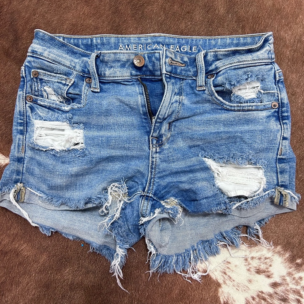 distressed blue jean shorts